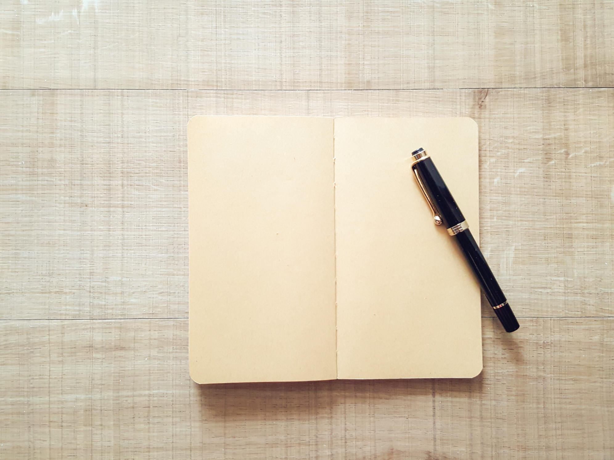 Notebook with Pen on Wooden Table, Vintage Picture Tone